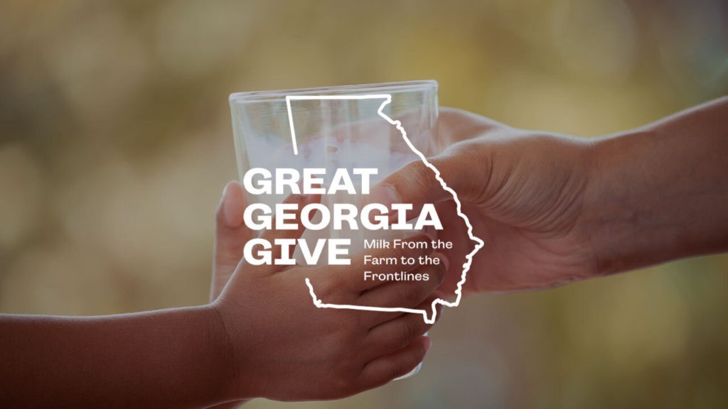 Great Georgia Give logo over image of two hands holding a glass of milk